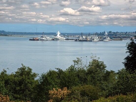 View looking north from Howarth Park to Naval Station Everett. Various navy ships, mainly destroyers are docked there.